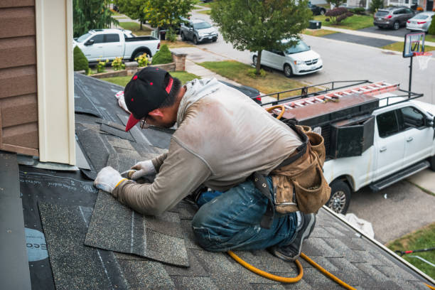 Professional Roofing technician working in East Wareham, MA